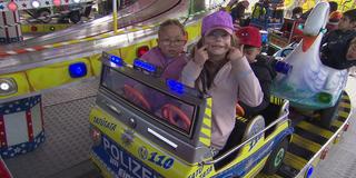Kinder auf der Mai-Kirmes in Saarbrücken (Foto: SR)