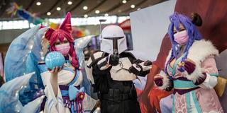 Verkleidete Besucher der Comic- und Fantasymesse "Comic Con" in Stuttgart. (Foto: picture alliance/dpa | Christoph Schmidt)