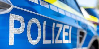 Aufschrift auf einem Polizeiwagen (Foto: picture alliance/dpa | David Inderlied)