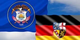 Flagge des US-Bundesstaates Utah und die Saarlandfahne (Foto: IMAGO / McPHOTO / pixabay/RonnyK)