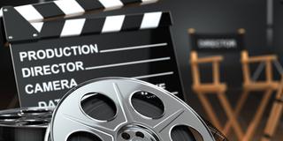 Kinoklappe und Filmrolle (Foto: fotolia)