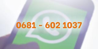 Ein Smartphone mit dem WhatsApp-Logo. Davor steht die Nummer 0681-6021037. (Foto: IMAGO / photothek)